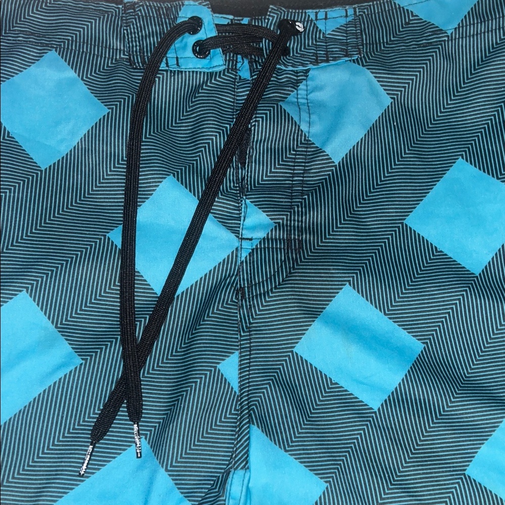 Hang Ten Teal and Black Geometric Swim Shorts. Never been worn!!!